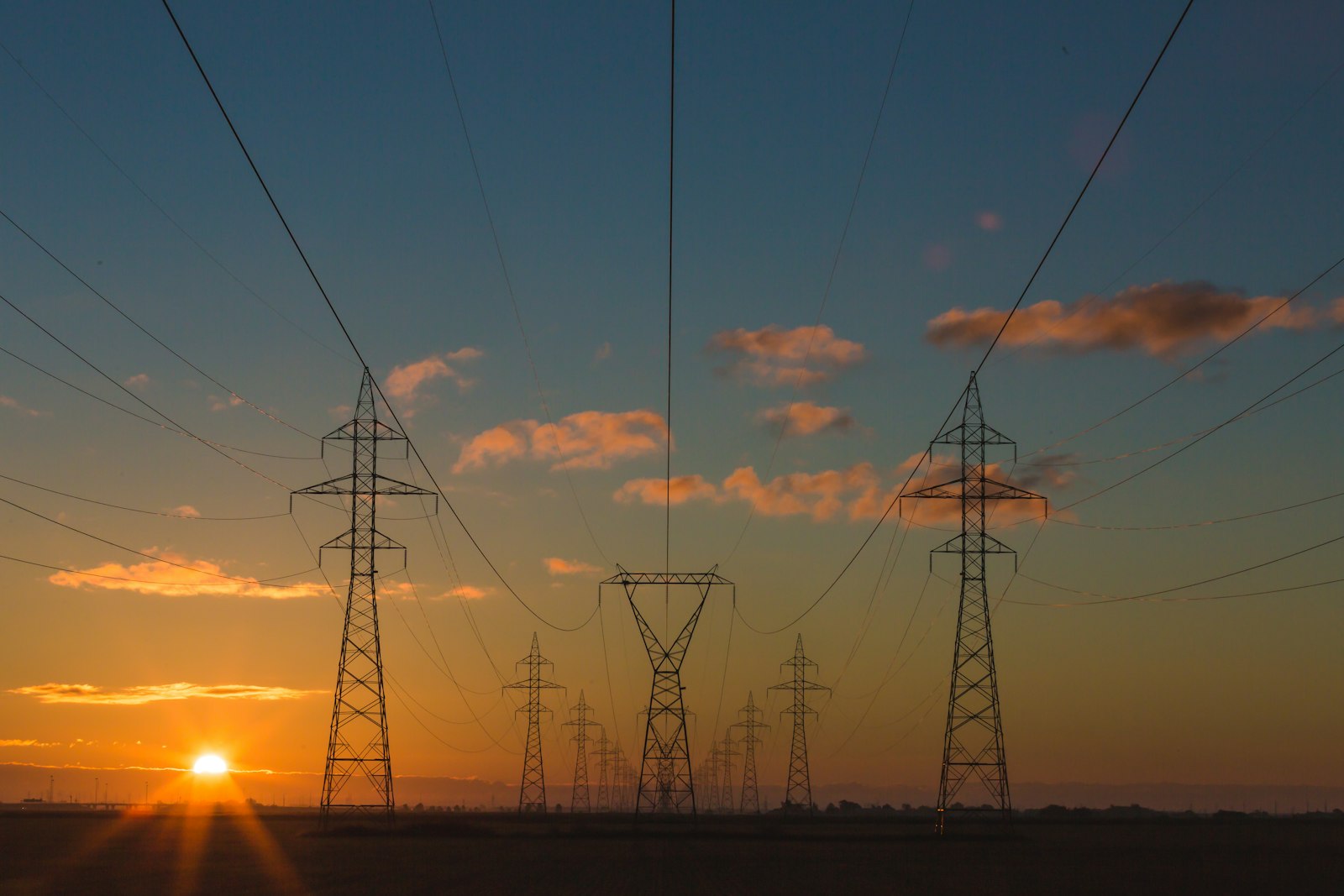 Energy infrastructure against an expansive sky